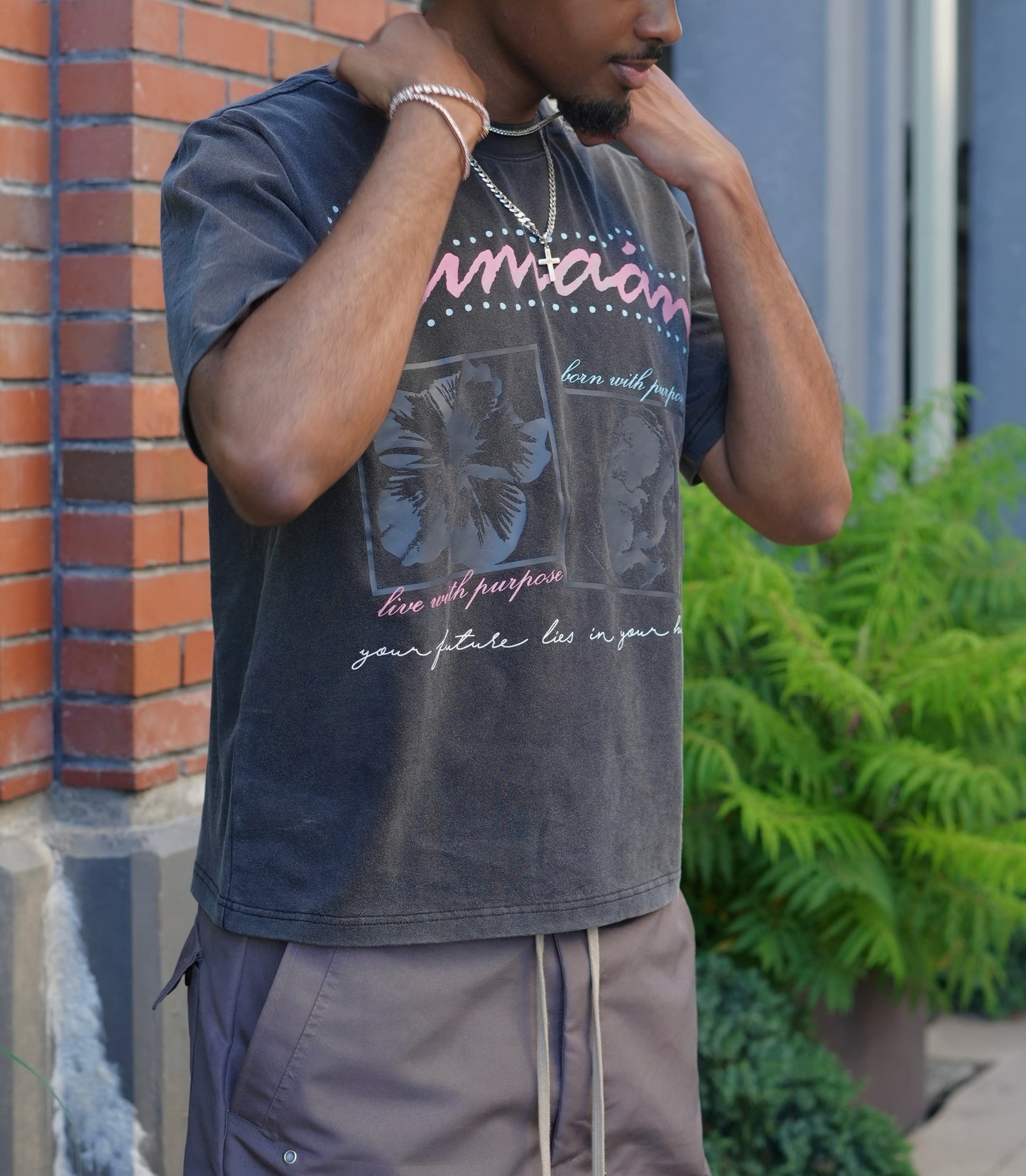 "born with purpose" washed black tee